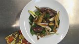Graeme Pallister’s warm salad of pigeon, spiced dressing, pear & pine nuts