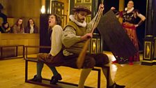 Orpheus (Mary Bevan) and Charon (Philip Smith) crossing the river Styx with Mark Milhofer looking on in Luigi Rossi's Orpheus