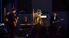 James performing on stage in BBC Scotlands Pacific Quay