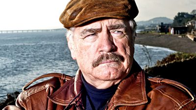 Brian Cox as Bob Servant