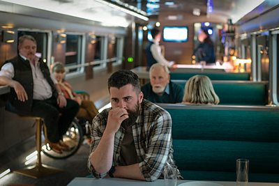Arran Moy (ALEX FERNS), Danny Geoghan (DANIEL CAHILL) & Fraser Warren (JAMES COSMO) in Nightsleeper (Credit: BBC/Euston Films/Mark Mainz)