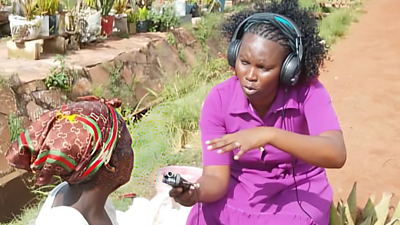 Angela Mtambo working in the field